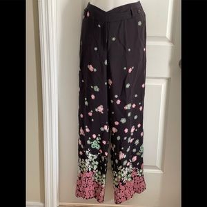 Anthropologie Printed straight pants size 8. Flowers abound, soft mauve border
